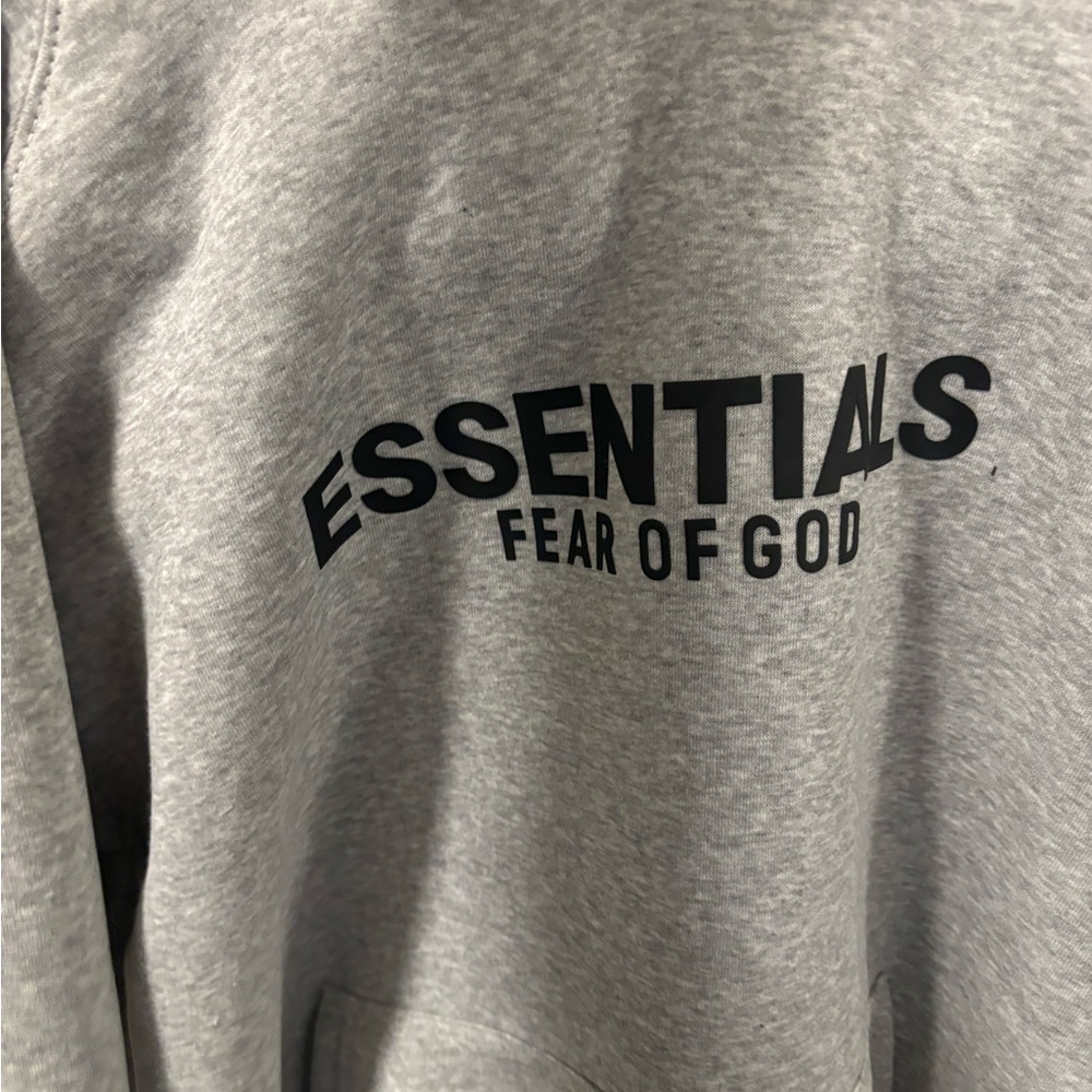 Essential fear of God new with tags hoodie. Medium